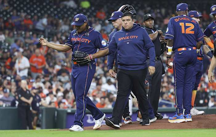 Houston pitcher Luis Garcia (77) walks off the mound after an apparent injury during the first inning against the San Francisco Giants. (Troy Taormina-USA TODAY Sports)